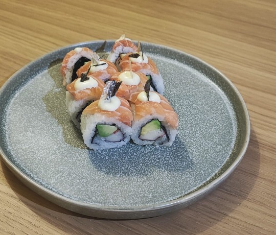 Weekly Premium: Salmon Skin Roll The Salmon Skin Roll, a weekly premium offering with salmon, crispy salmon skin, and mayo.