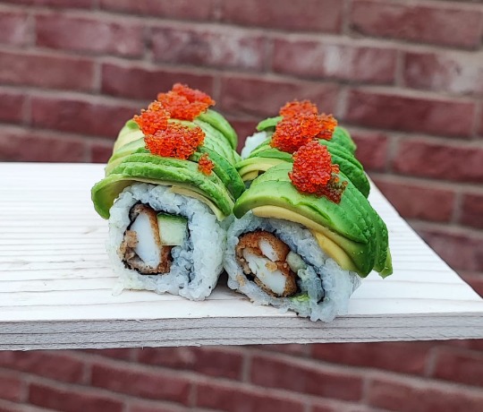 Weekly Premium: Squid and Avocado Tobiko Roll This week's premium roll featuring squid, avocado, and tobiko.